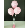 3 Bedrukte ballonnen op een stokje in een vaasje