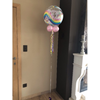 Bubble met helium met gewicht