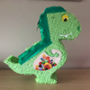 Dino met tekening snoep op de buik