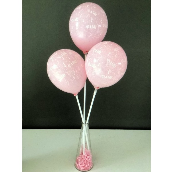3 Bedrukte ballonnen op een stokje in een vaasje